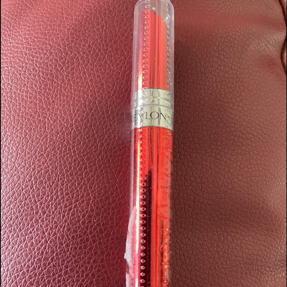 Sealed never opened “Revlon” lipstick red